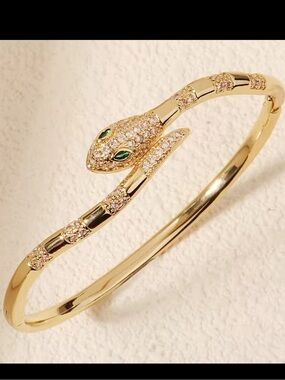 Gold Snake Bangle with Green Eyes